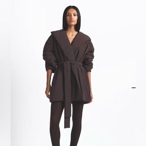 Brand new NikeSkims Woven Nylon wrap coat size M